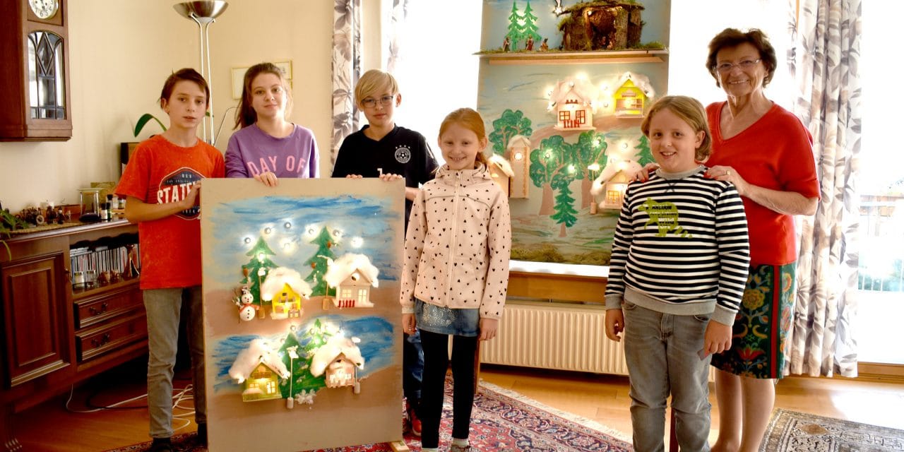 Kinder gestalten Ort als Adventskalender